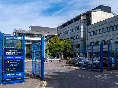 Highbury Campus entrance sign showing directions to visitor parking, reception and the Sports Centre