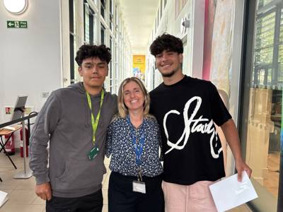 staff celebrate with students