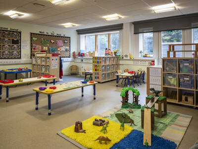A fully equipped baby childcare room at Honeypot Nursery 