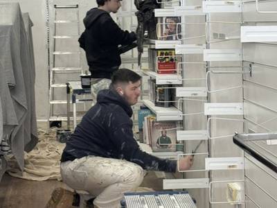 Painting and Decorating students working together on redecorating DEBRA Southsea