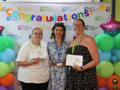staff celebrate with students