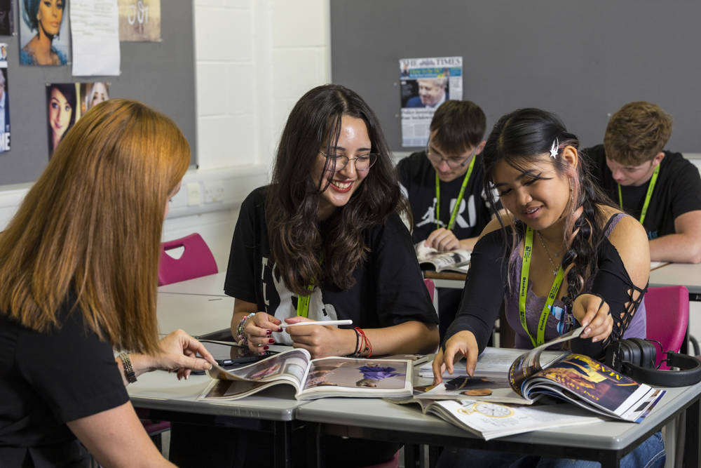 Students studying in a media and film classroom