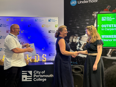 Principal and CEO Katy Quinn presenting an award at North Harbour Campus