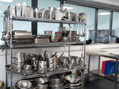 Catering equipment on a shelving unit 