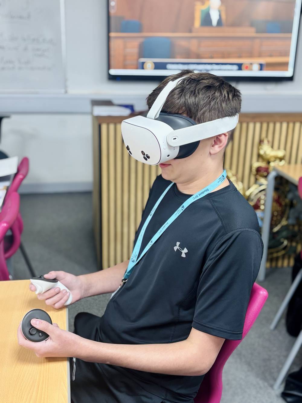 A City of Portsmouth College student wearing a VR headset