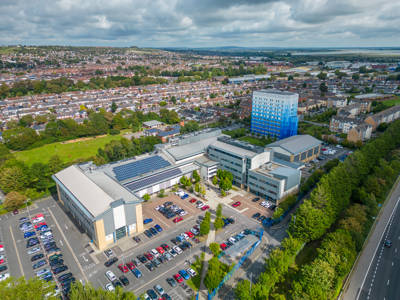 Aerial view from Highbury Campus across Portsmouth and surrounding countryside