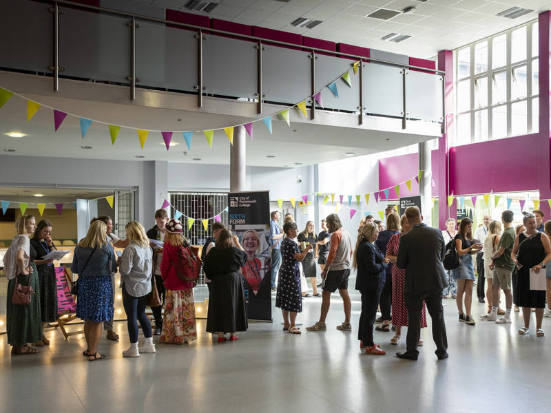 Students gathered in the college canteen for a A Level results day 