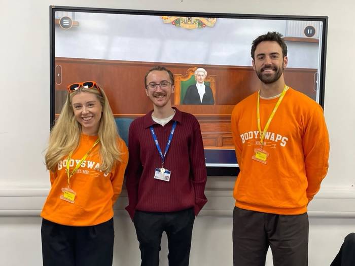 Janie Gonsalez and Paddy Ferguson from Bodyswaps pose with Jack Pauley from City of Portsmouth College