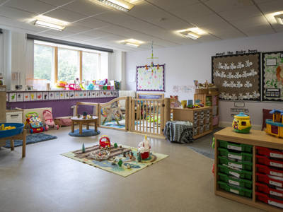 A fully equipped baby childcare room at Honeypot Nursery 