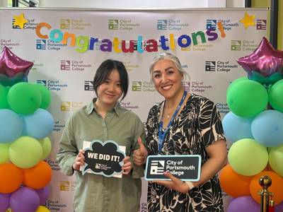 staff celebrate with students