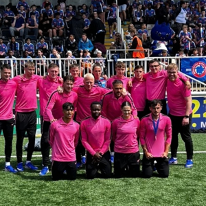 City of Portsmouth College staff and students pose for a team photo at the Monster Kickabout Tour 2026 alongside England football legend Jill Scott