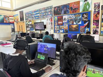 Students working independently on digital projects in a specialist Computing, Digital and IT classroom.