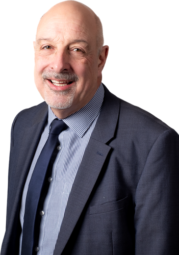 A headshot of Huw Chapman